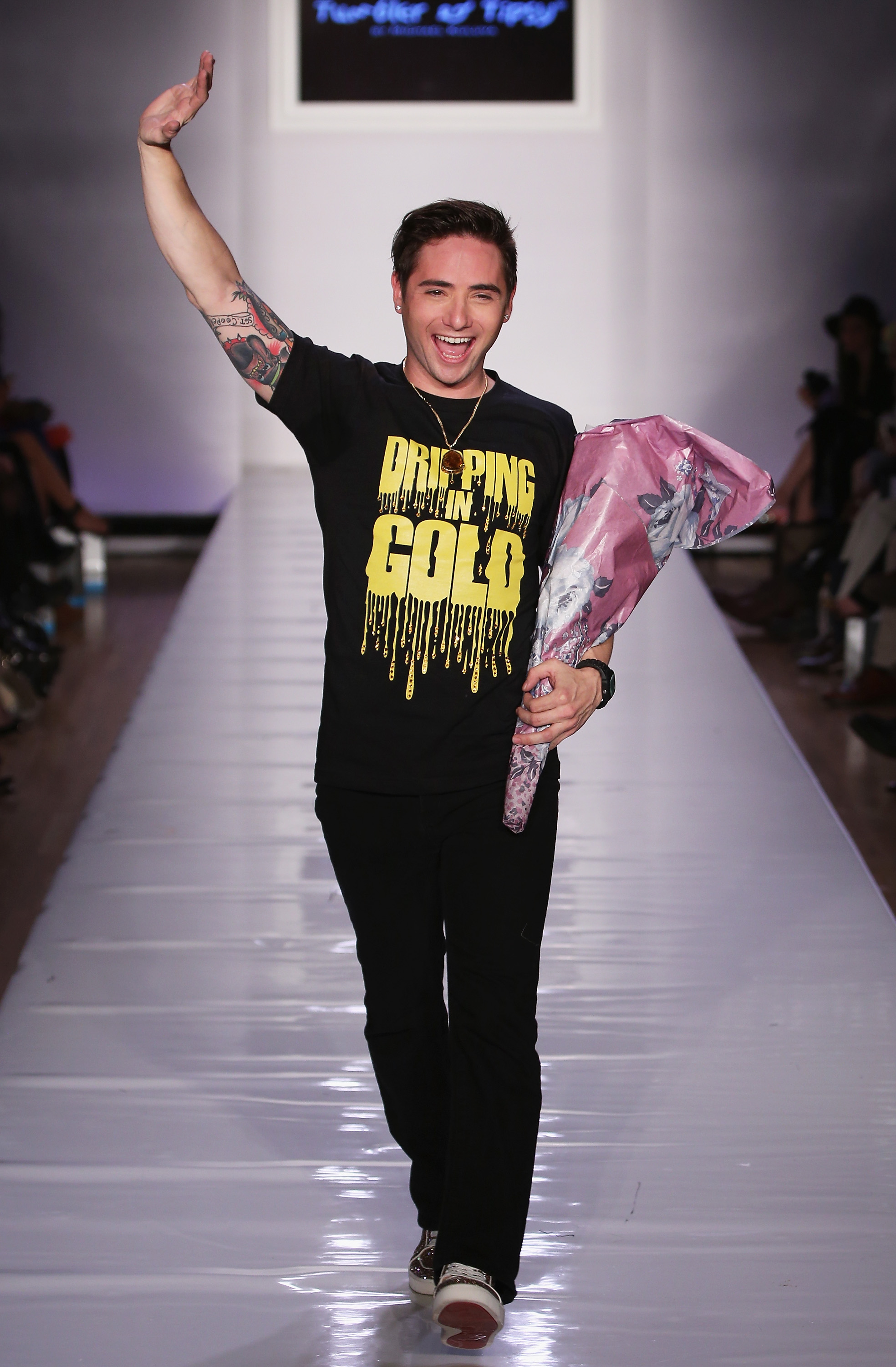 Michael Kuluva walking the runway at New York Fashion Week Tumbler and Tipsy Fall 2013